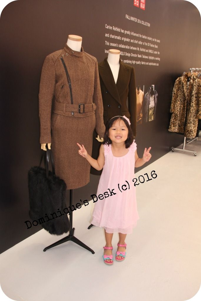 Tiger girl posing beside one of the collections