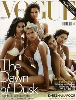 Cover of Indian Vogue magazine featuring five women in white bathing suits on the beach