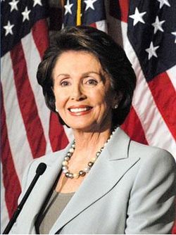 Photo of Nancy Pelosi smiling in front of an American flag></p>
<p>On January 4th, 2007 <a href=