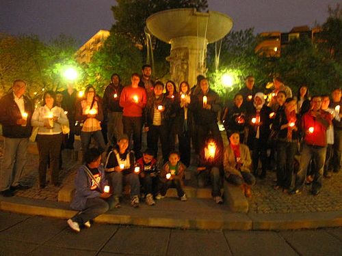 activists gathered at dupont circle for vigil to protest AZ legislation, group gathered with candles