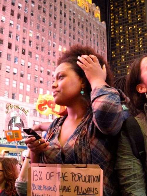 Photo of woman at Occupy Wall Street protest in Times Square