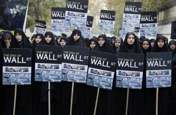 Iranian women standing in support of Occupy Wall Street