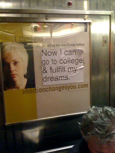 Ad reads: Abortion changes you, sticker put over ad reads: Now I can go to college and fulfill my dreams