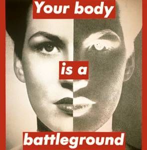 iconic image reads your body is a battleground over woman's face