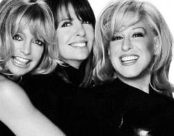 Goldie Hawn, Diane Keaton, and Bette Midler, stars of The First Wives Club, pose smiling in a black and white photo