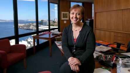 Lara Giddings sits, smiling, in her new office overlooking Hobart Harbour