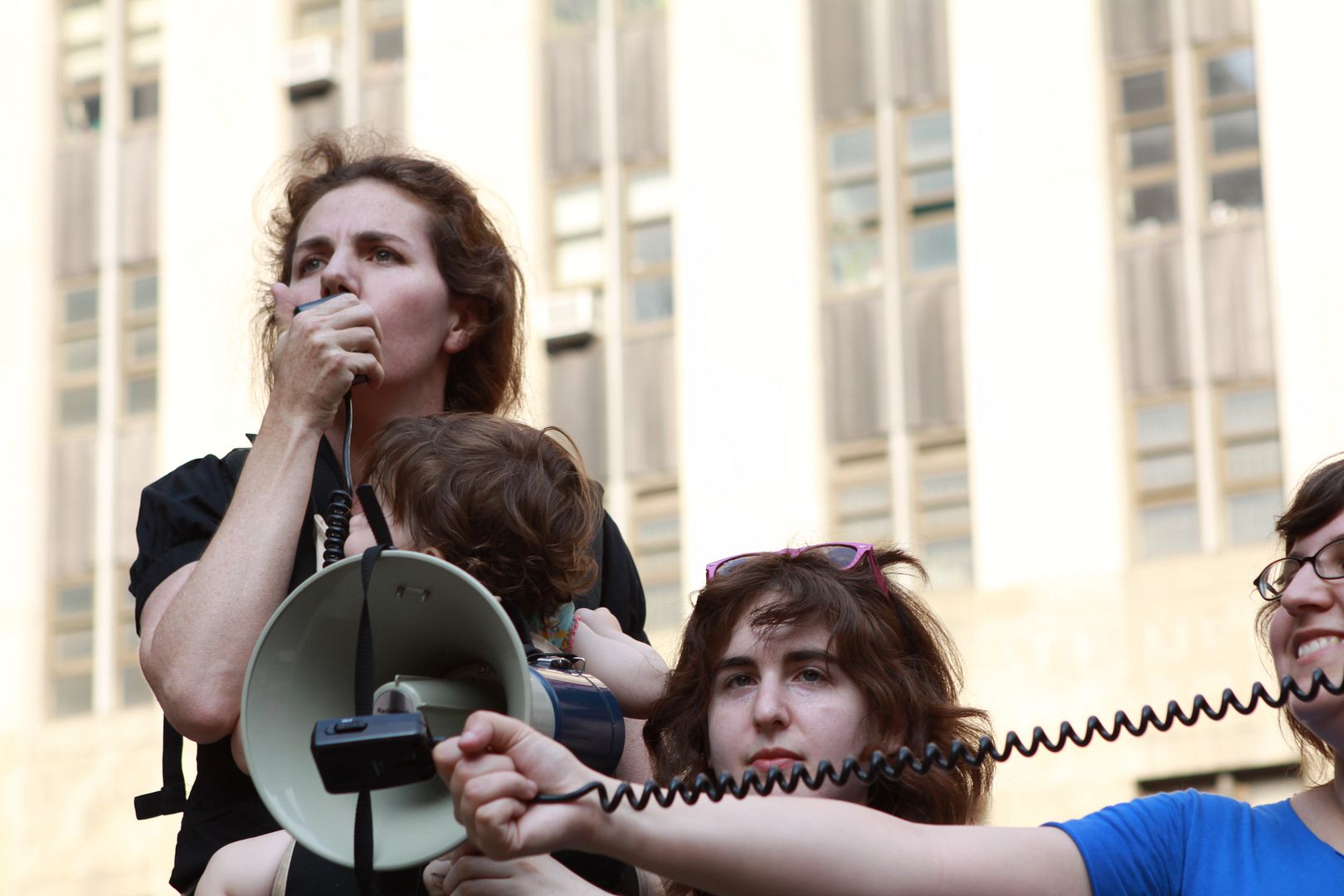 woman with child speaks out at last rally