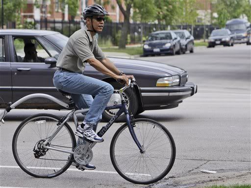 Obama riding bike Pictures, Images and Photos